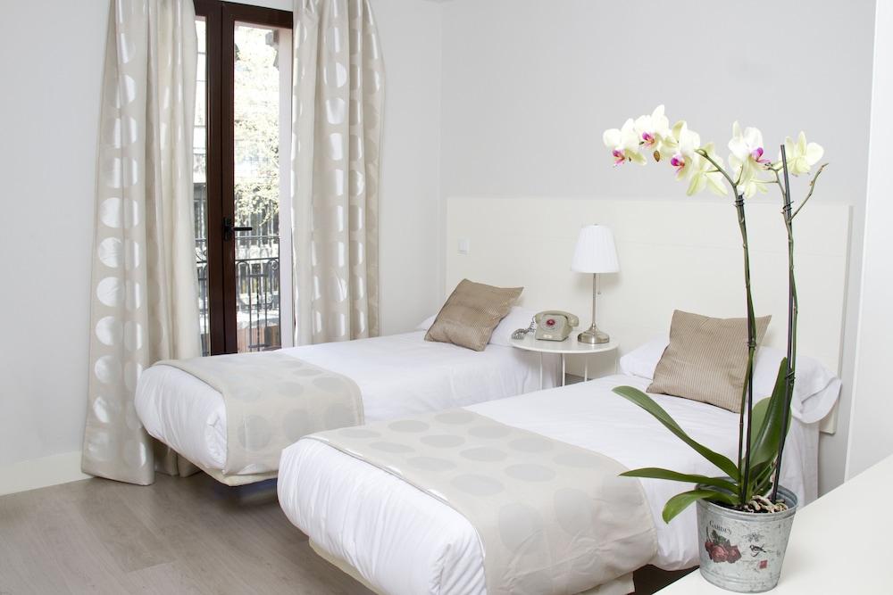 8Rooms Madrid - Featured Image